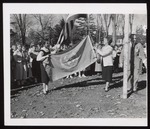 Maureen DeCourcy Raising the UN Flag, Westbrook Junior College, 1956