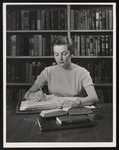 Theresa Vangeli in the Library, Westbrook Junior College, June 1954 by William M. Rittase