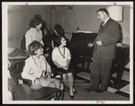 Arthur Freundlich and Westbrook College Students in Wing Lounge, Alexander Hall, 1964 by Portland Press Herald