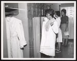 Three Dental Hygiene Students Change into Uniforms, Westbrook Junior College, 1961 by Wendell White Studio