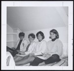 Four Students Sit on Bed, Westbrook Junior College, 1966